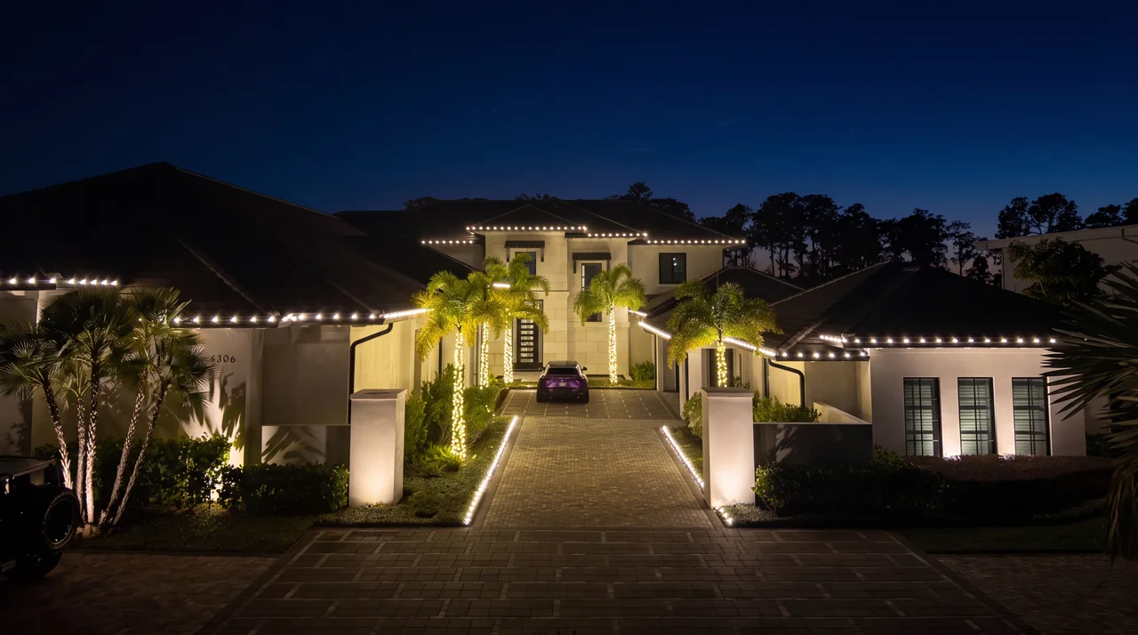 Lakefront estate roofline — Christmas light installation in Windermere, FL by Hang & Glow Crew